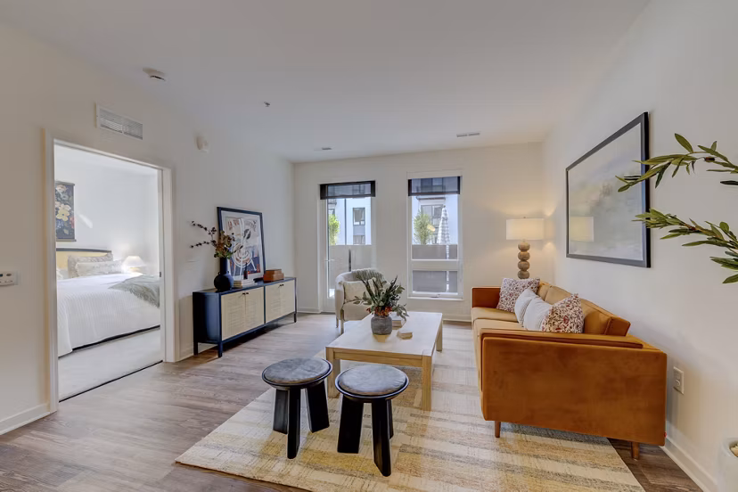 Modern living room with stylish furnishings at The James Apartments