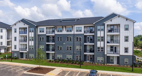 Arlow at Blue Ridge Apartments: Elegant building in a serene setting, exemplifying Greystar luxury apartments in North Carolina