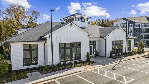 Modern clubhouse with cozy seating and billiards at Arlow at Blue Ridge Apartments