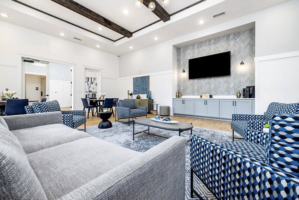 Arlow at Blue Ridge Apartments: Modern clubhouse featuring luxury seating and gaming areas