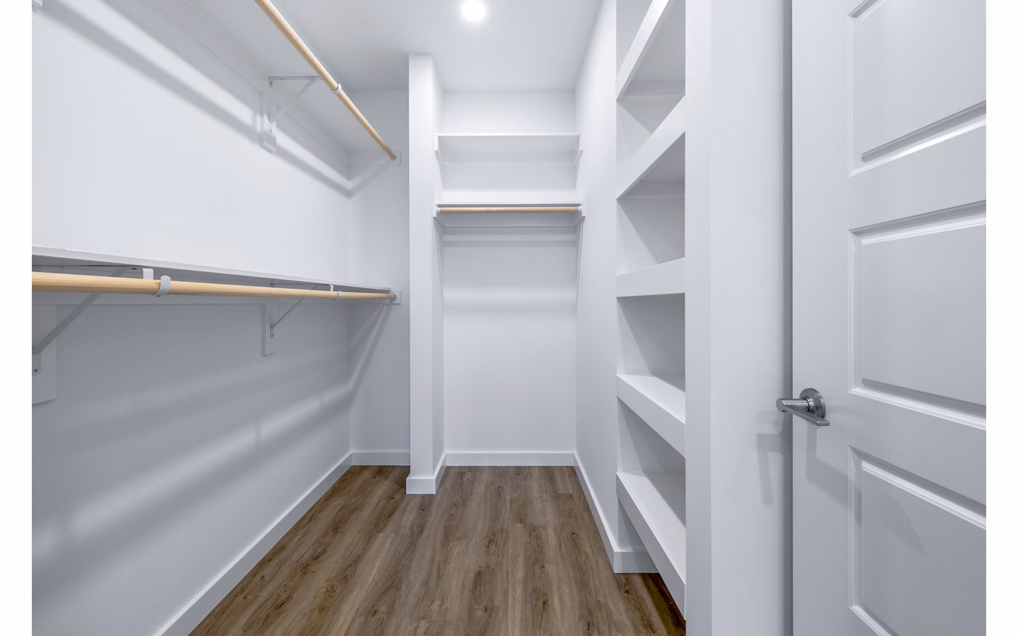 Bedroom closet with built-in shelving at Willamette Tower Apartments