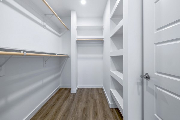 Bedroom closet with built-in shelving at Willamette Tower Apartments
