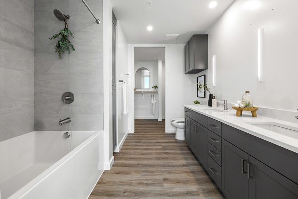Modern bathroom with sleek fixtures at Willamette Tower Apartments, a luxury living space by Greystar