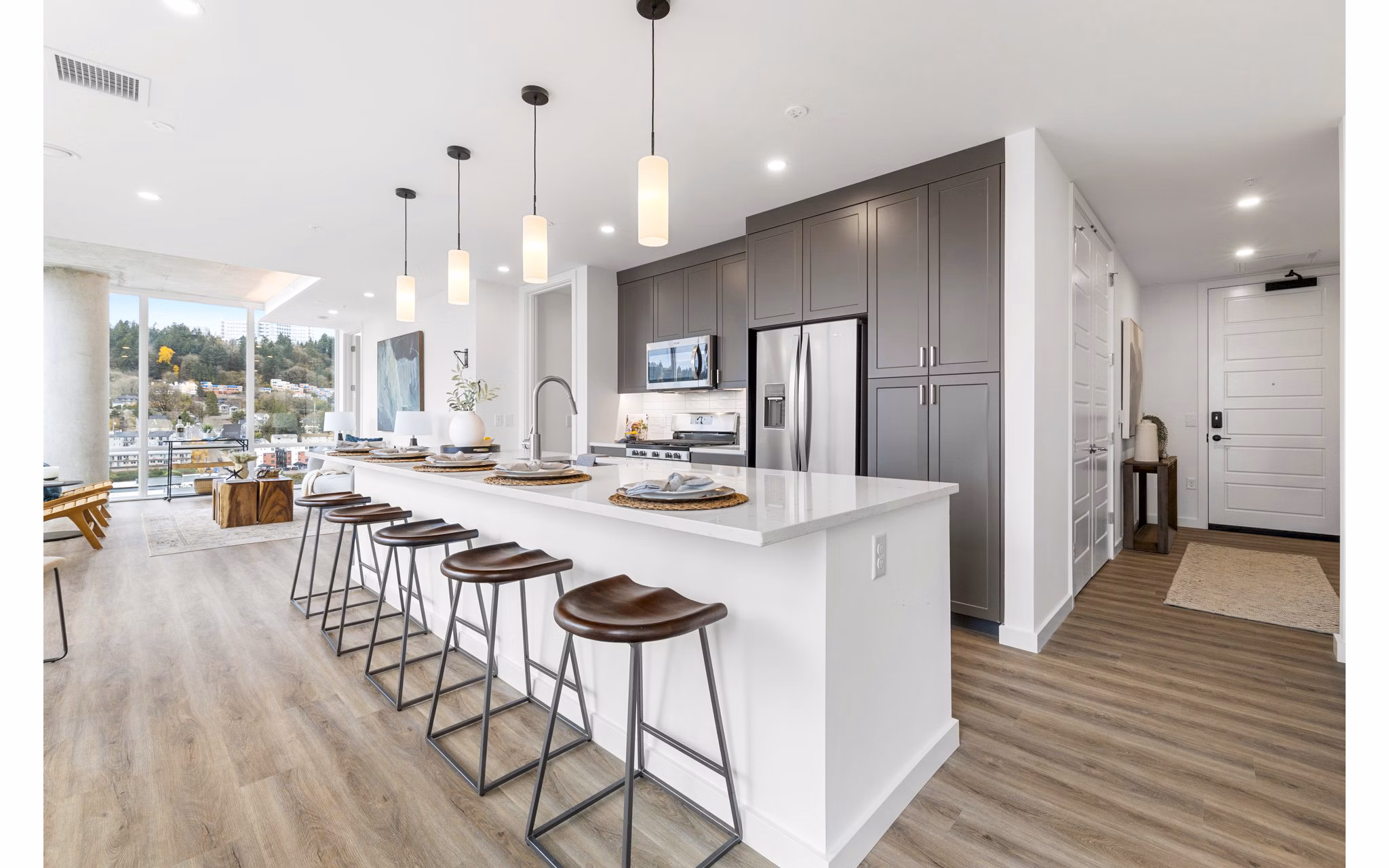 Modern kitchen featuring stainless steel appliances in Willamette Tower Apartments