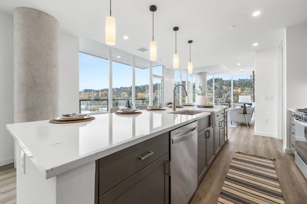 Spacious kitchen with modern appliances in Willamette Tower Apartments
