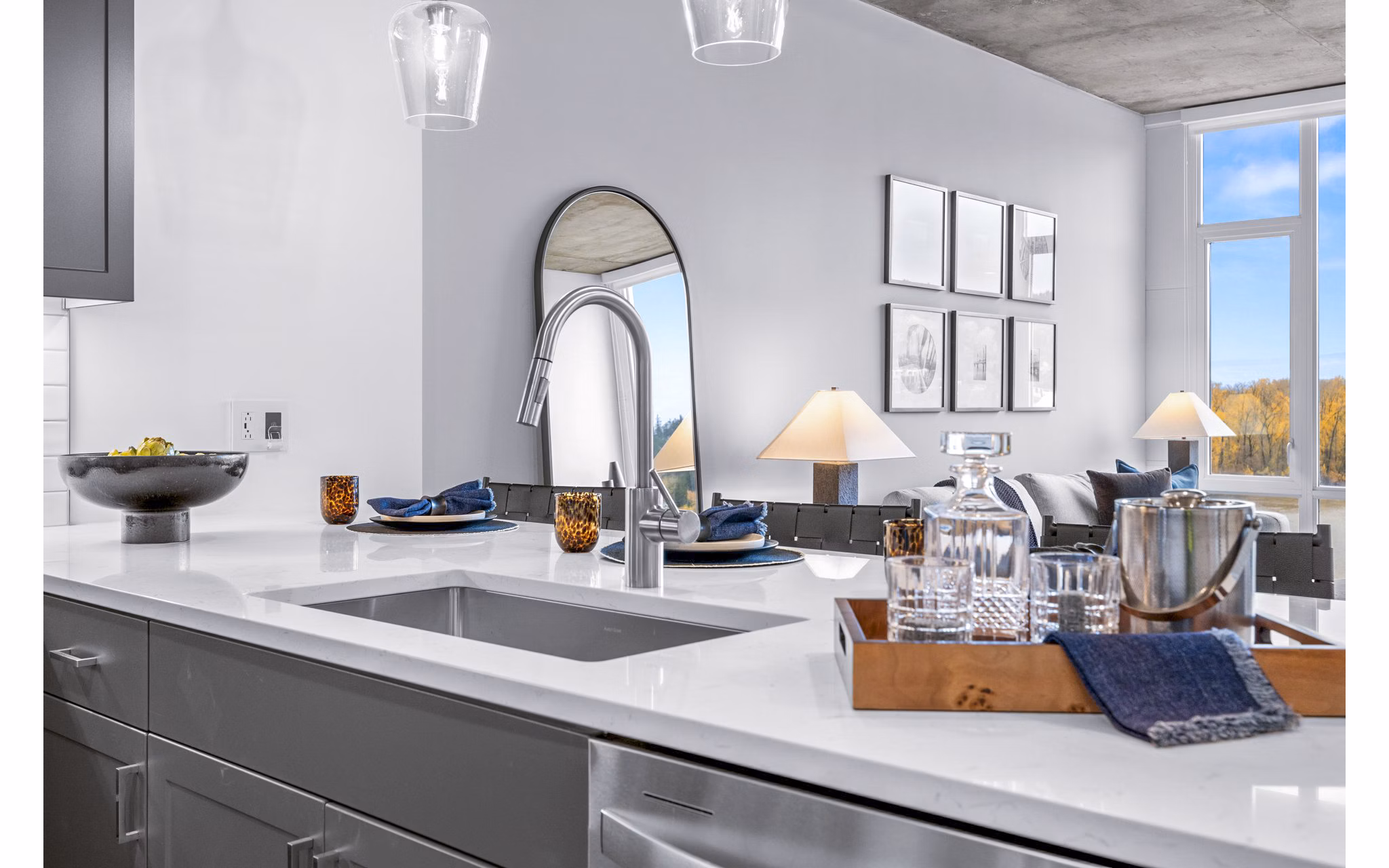 Modern kitchen with stainless steel appliances in Willamette Tower Apartments