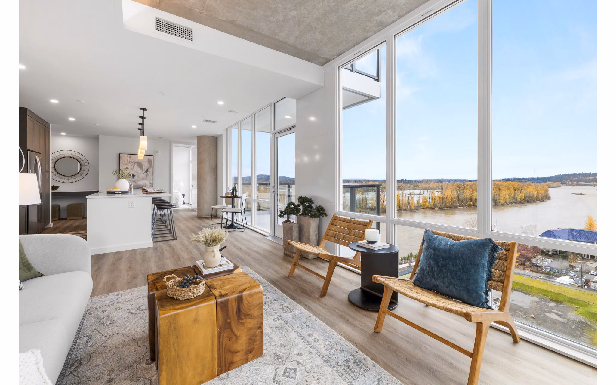 Spacious living room with modern decor in Willamette Tower Apartments