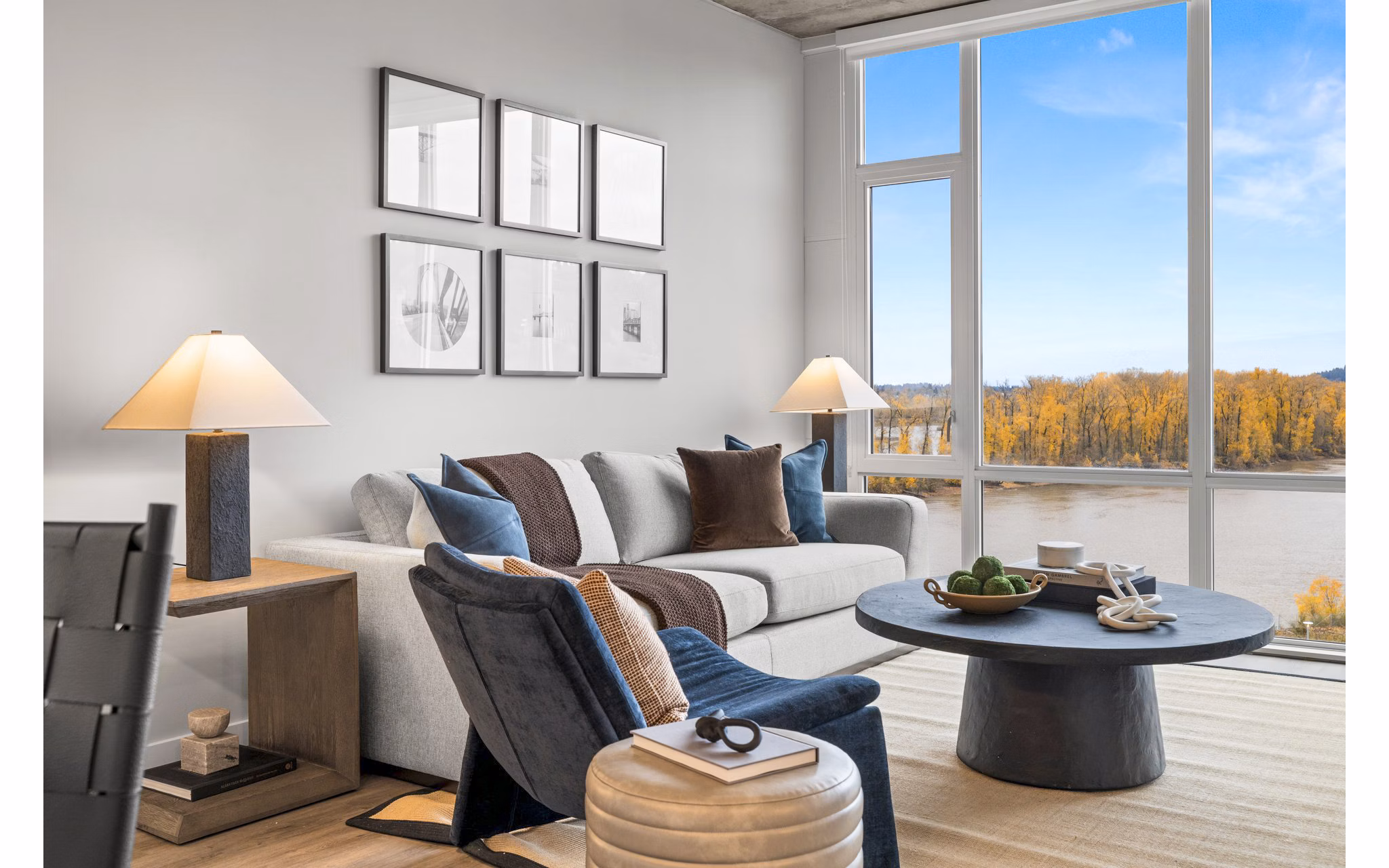Contemporary living room with modern furnishings at Willamette Tower Apartments, offering luxury living in a vibrant neighborhood