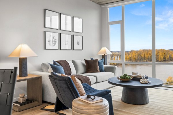 Contemporary living room with modern furnishings at Willamette Tower Apartments, offering luxury living in a vibrant neighborhood