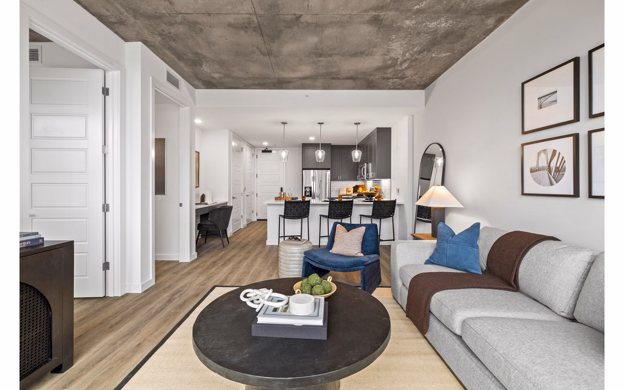 Spacious living room with modern furnishings in Willamette Tower Apartments, a Greystar luxury apartment community