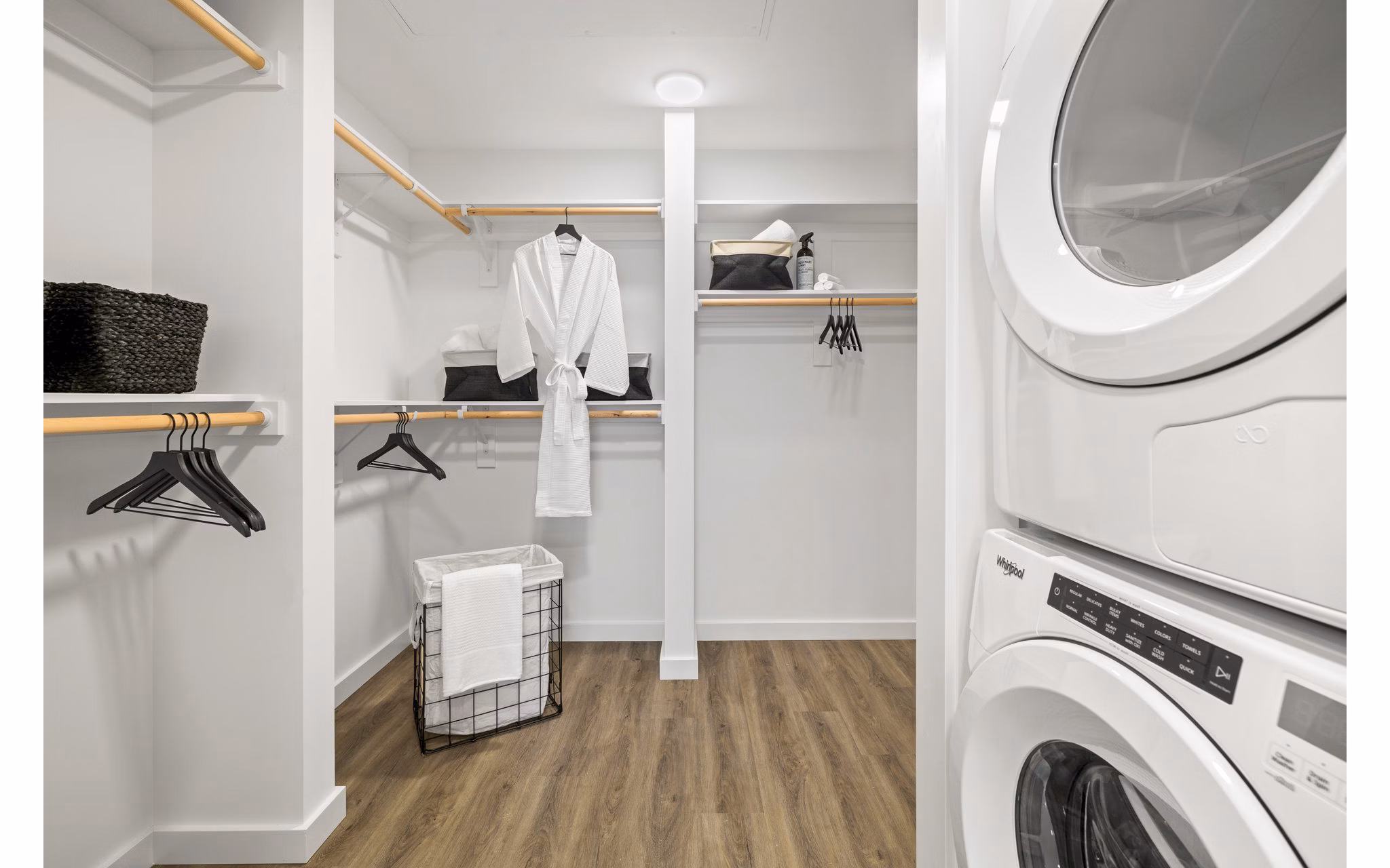 Closet and laundry room with modern storage solutions at Willamette Tower Apartments