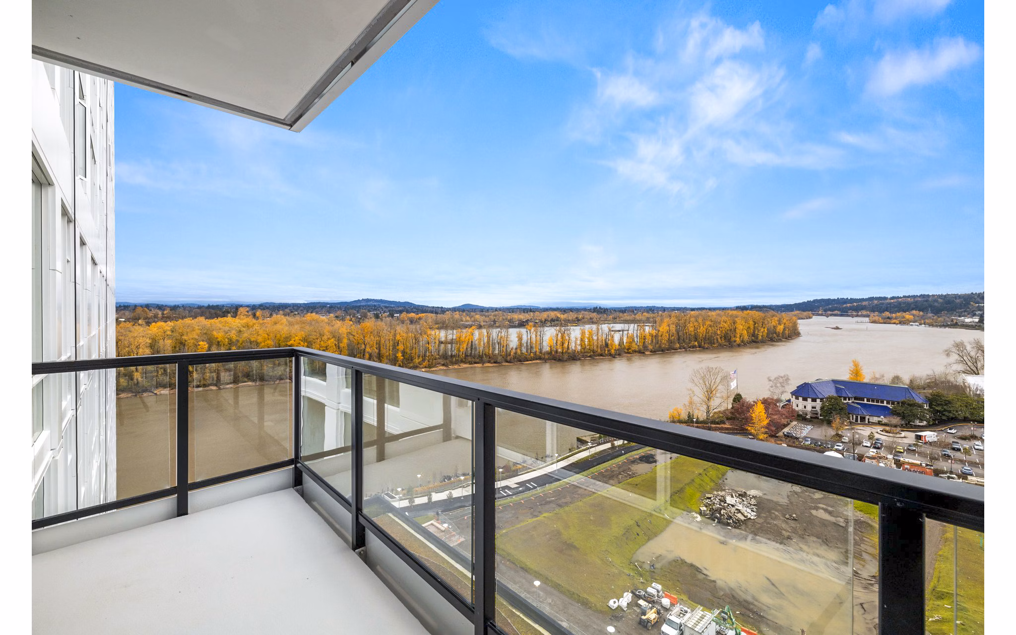 Cozy patio with scenic city views at Willamette Tower Apartments providing outdoor relaxation space
