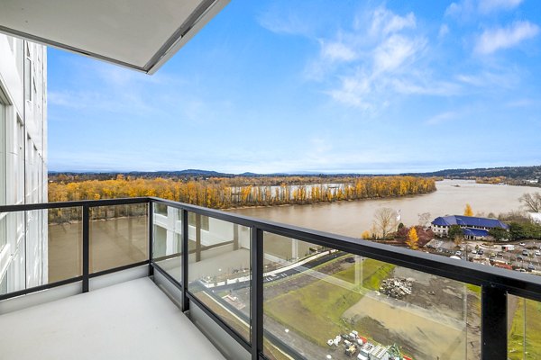 Cozy patio with scenic city views at Willamette Tower Apartments providing outdoor relaxation space