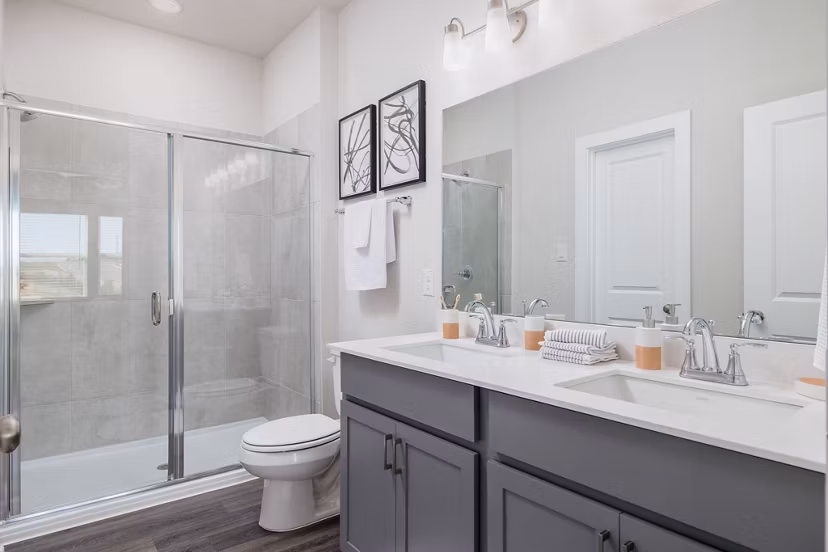Modern bathroom with sleek fixtures at Caso University Heights Apartments