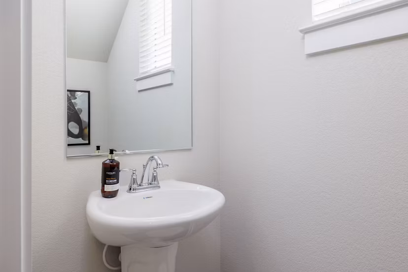Bathroom featuring elegant fixtures and modern design at Caso University Heights Apartments