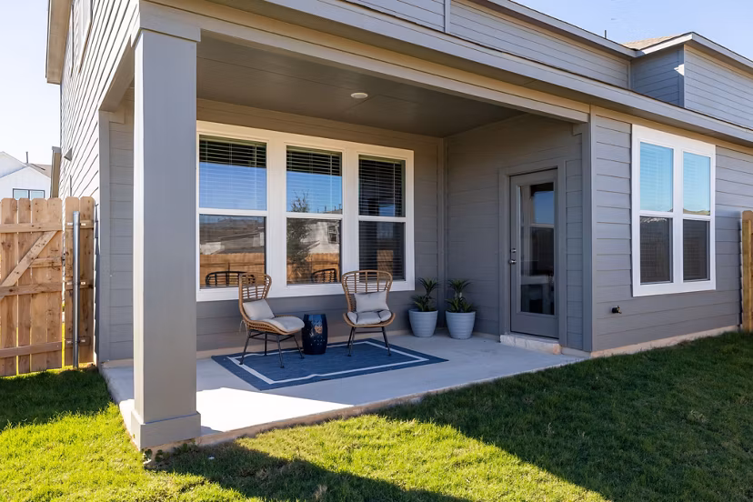 Scenic patio with outdoor seating at Caso University Heights Apartments, ideal for relaxation and gatherings in a vibrant community setting