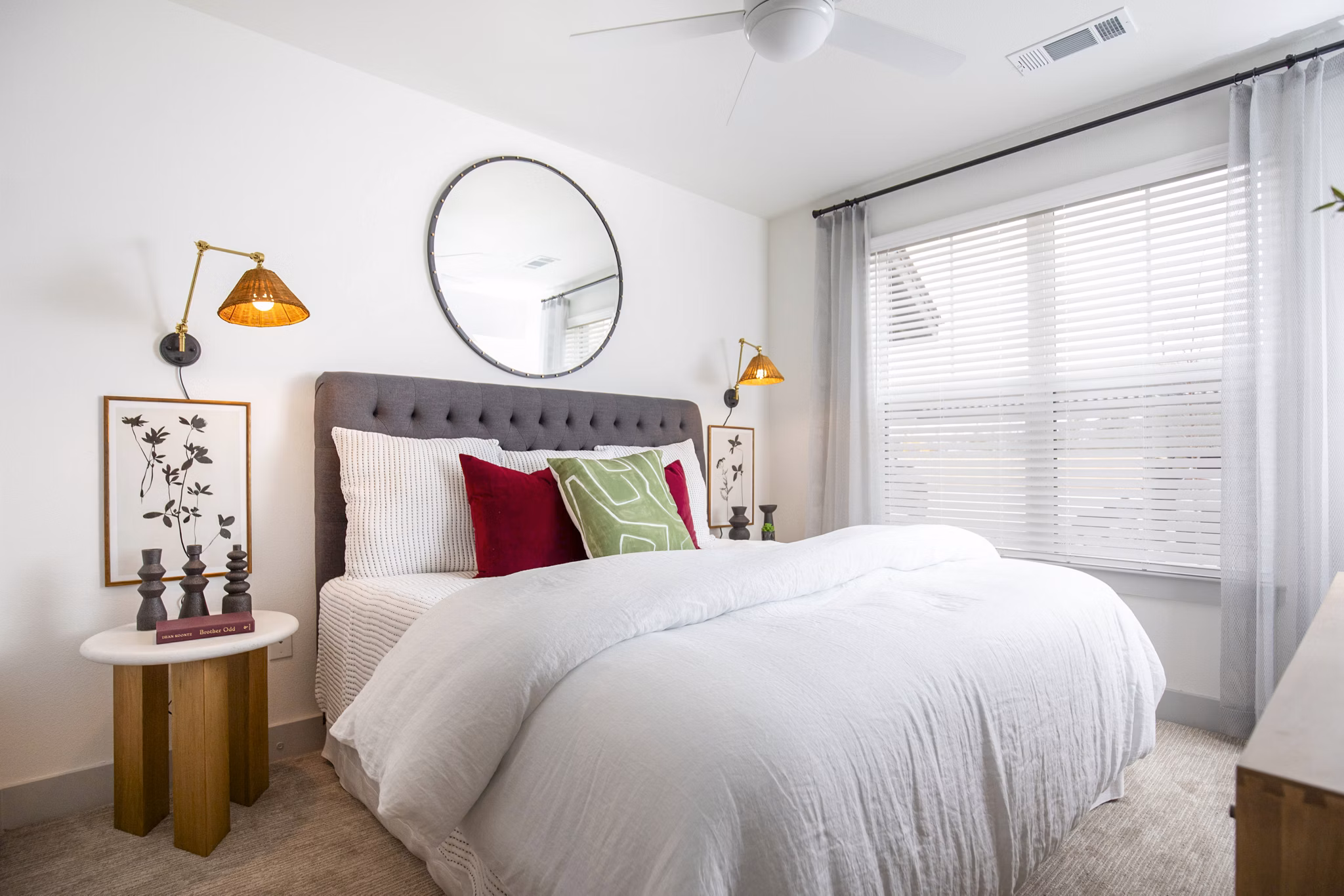 The Madison at City Place: Elegant bedroom with cozy lighting and modern decor