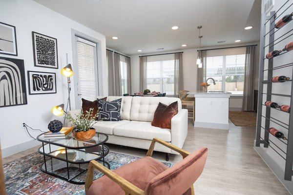 Modern living room with stylish decor at The Madison at City Place Apartments