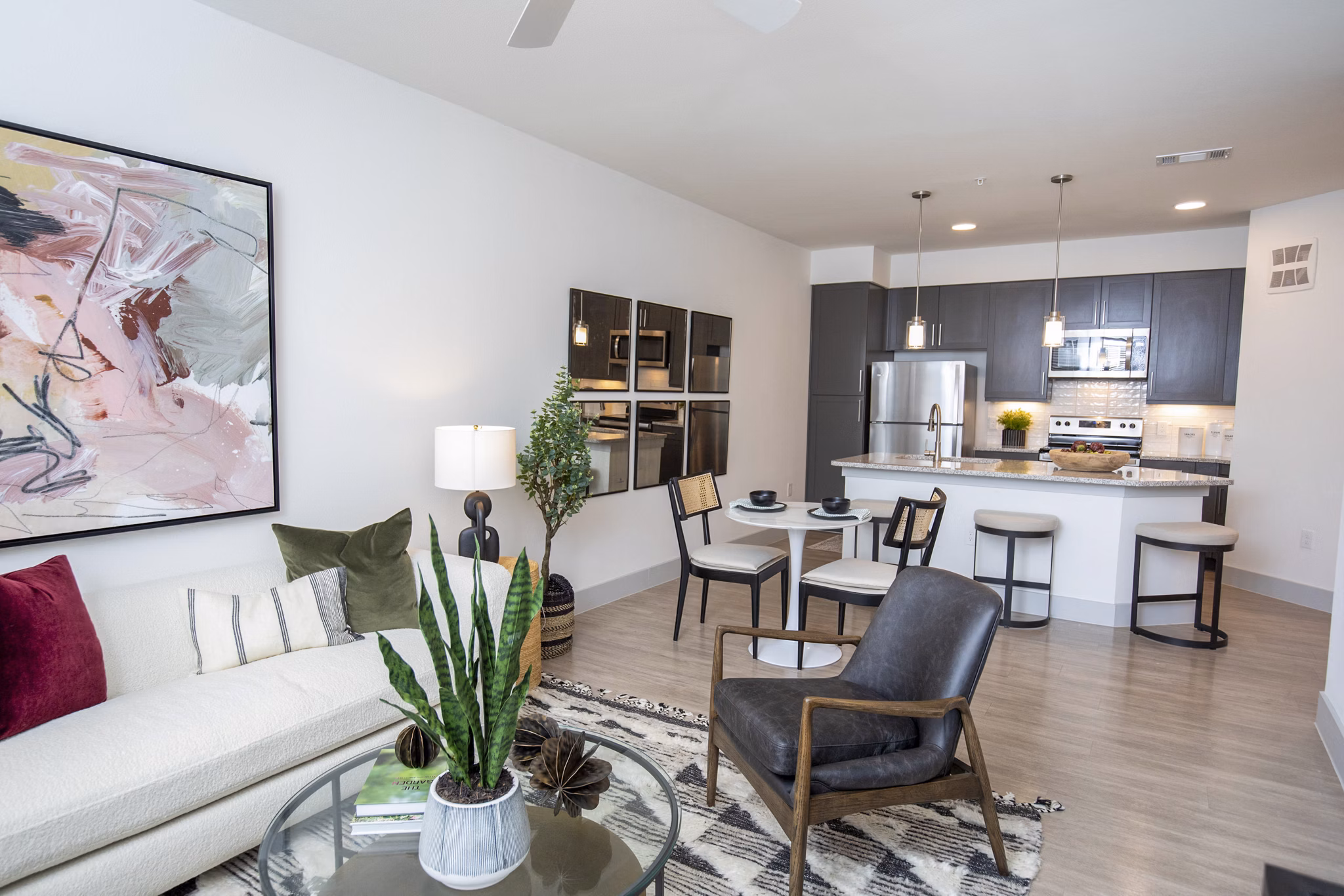 Spacious living room with modern decor in The Madison at City Place Apartments