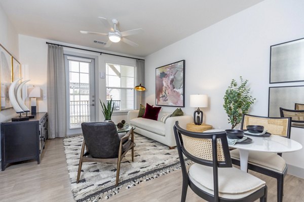 Modern living room with sleek furniture in The Madison at City Place Apartments