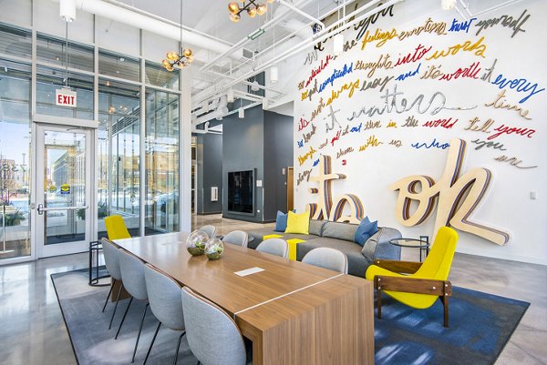 Contemporary clubhouse lobby with modern decor at Spoke Apartments