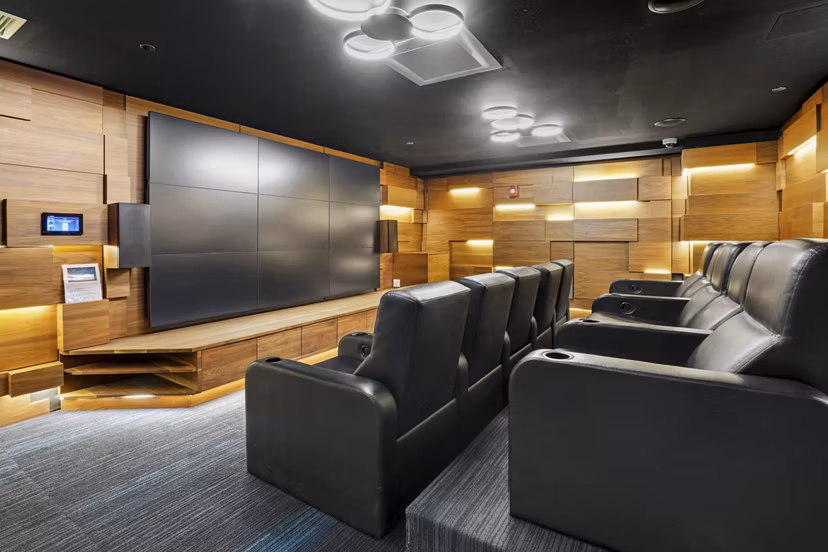 Modern clubhouse meeting facility with sleek furnishings at Spoke Apartments, perfect for gatherings and events