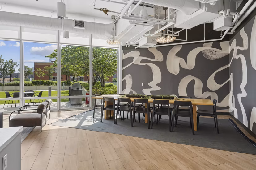 Clubhouse theater with plush seating at Spoke Apartments, a luxury community