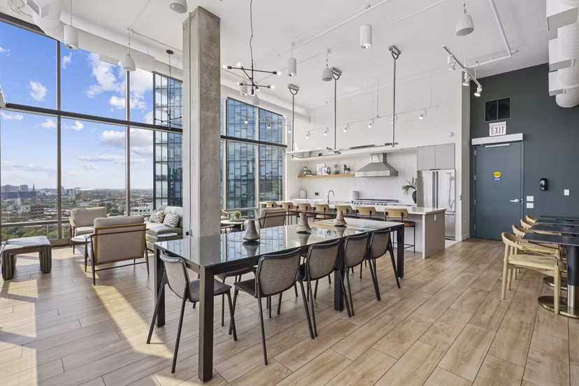 Modern clubhouse kitchen with sleek countertops at Spoke Apartments, perfect for social gatherings and culinary events