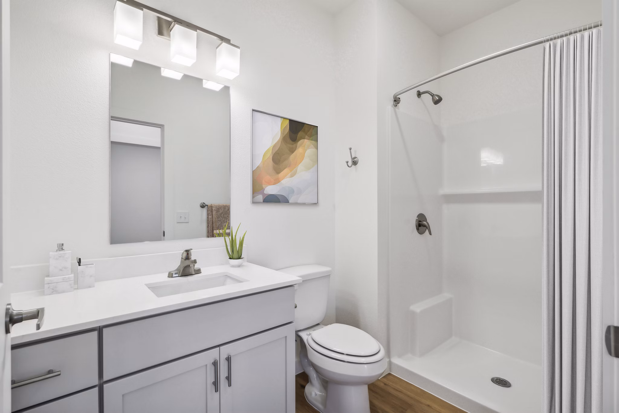 Modern bathroom with sleek fixtures at Pure OKC Apartments