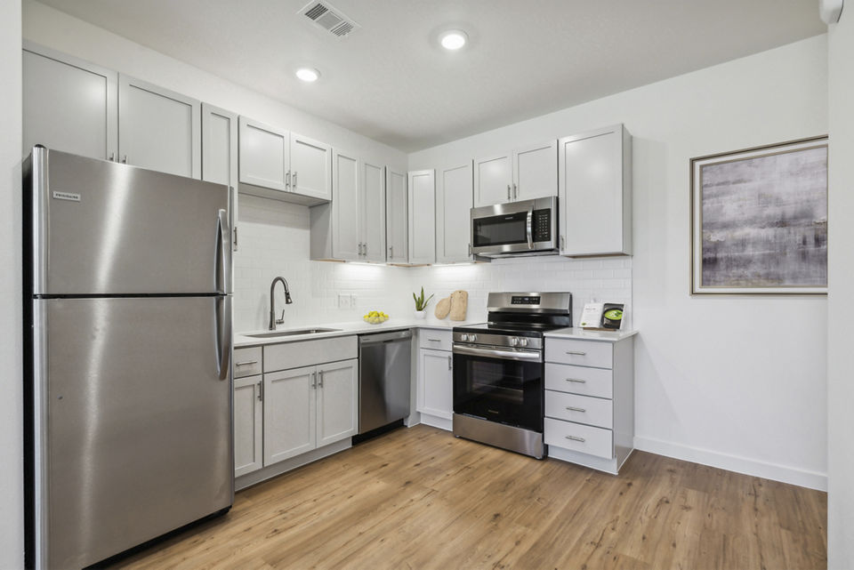Modern kitchen featuring stainless steel appliances at Pure OKC Apartments