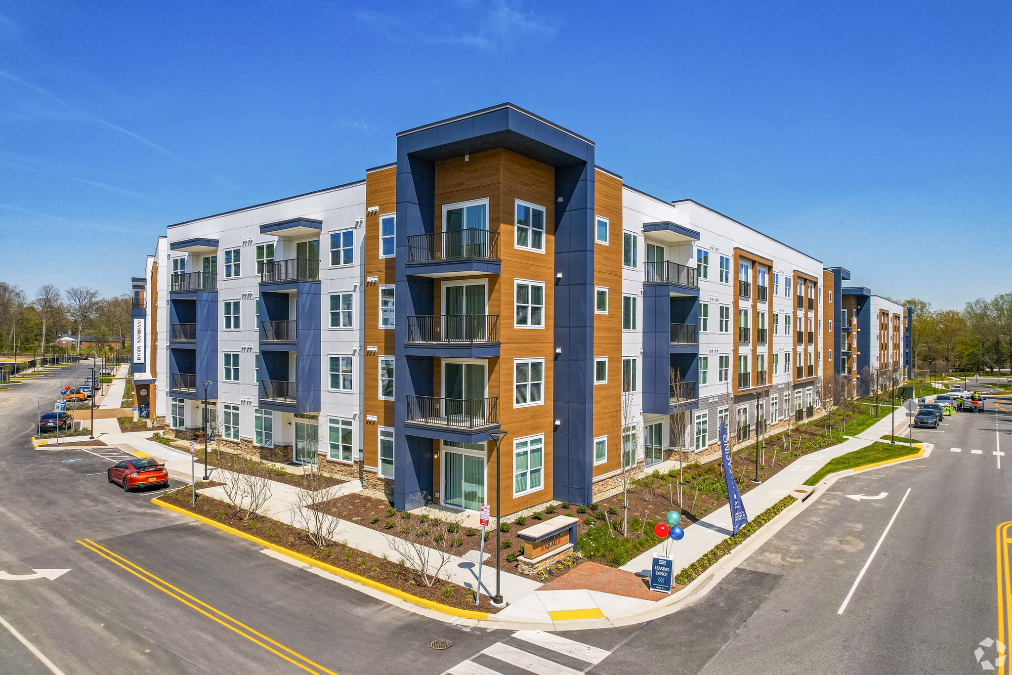 Innsbrook Square: Chic building view at luxury apartments in a sought-after neighborhood