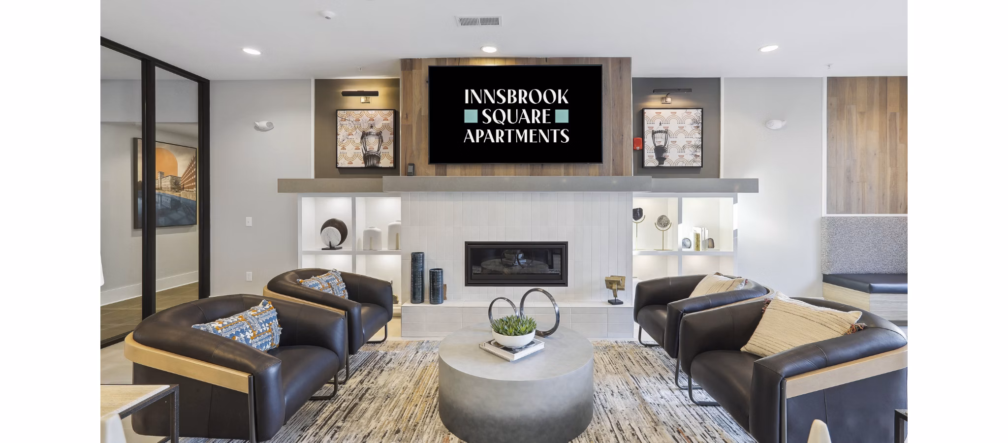 Clubhouse featuring modern interiors and ample seating at Innsbrook Square Apartments