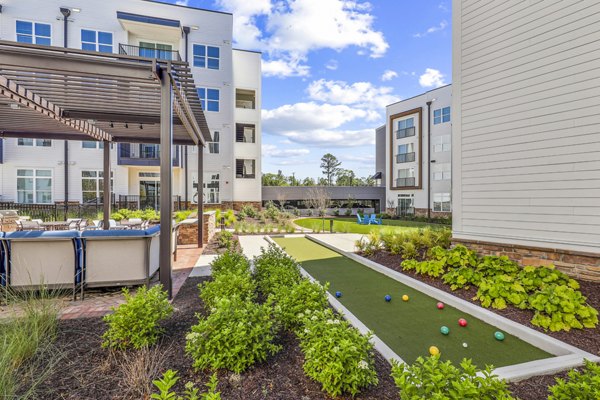 Vibrant recreational area with lush greenery at Innsbrook Square Apartments, ideal for relaxation and outdoor activities