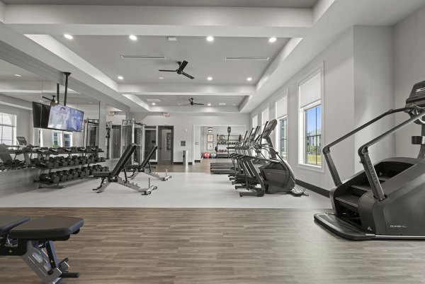 fitness center at Reverie Belmont Apartments
