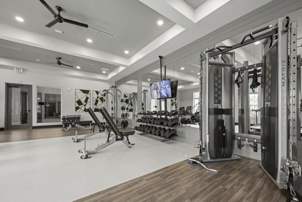 fitness center at Reverie Belmont Apartments