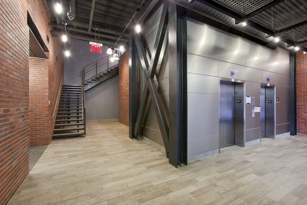 Clubhouse lobby featuring modern decor and comfortable seating at Embankment House Apartments