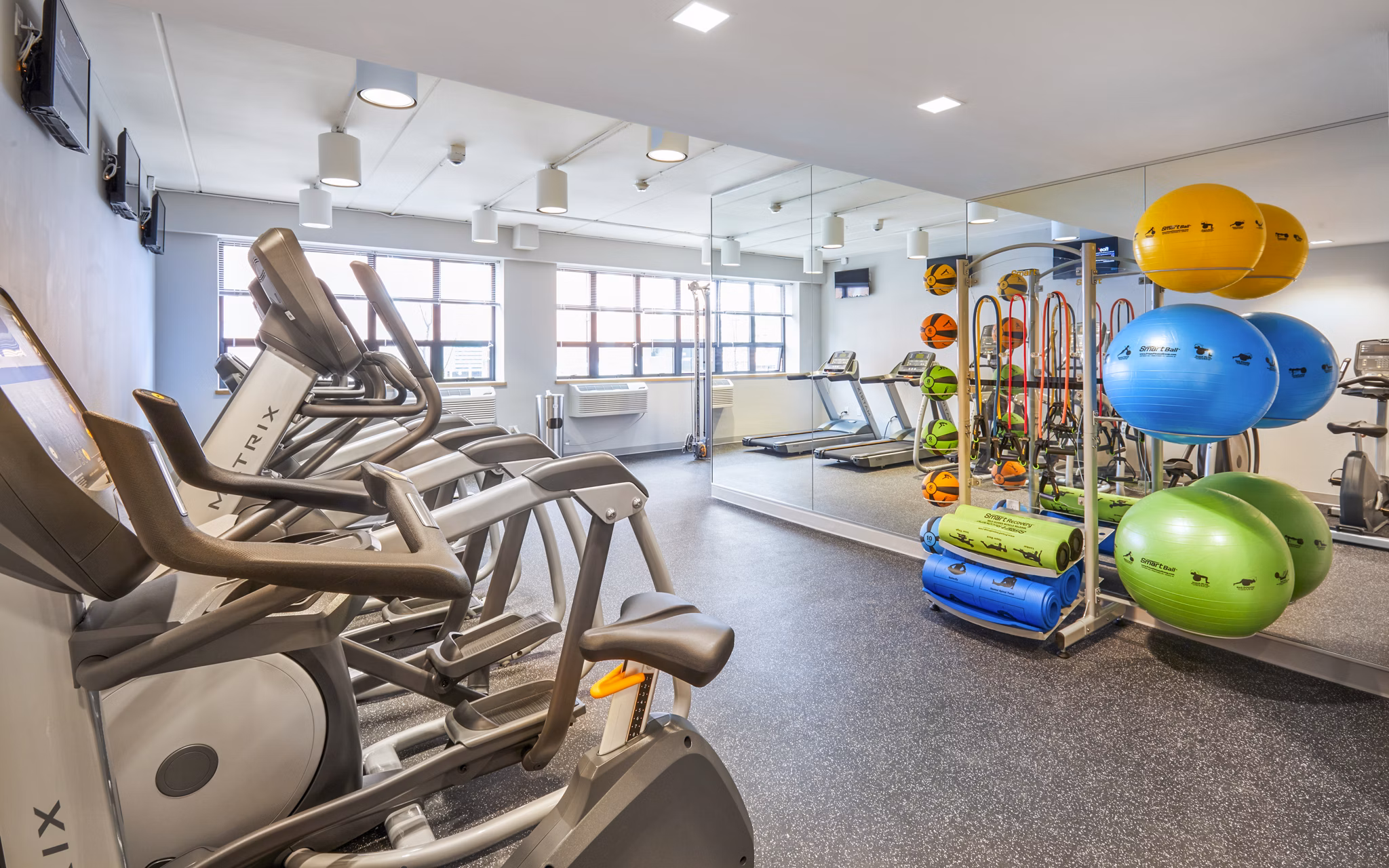 Fitness club with modern equipment at Embankment House Apartments
