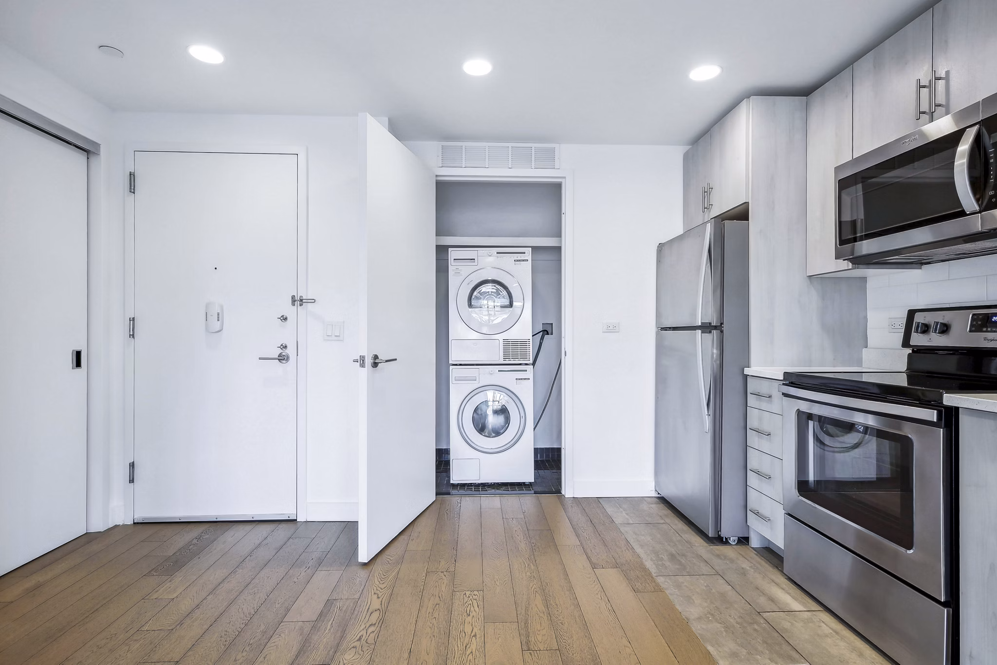 Modern kitchen with stainless steel appliances at Embankment House Apartments; part of Greystar's luxury living portfolio