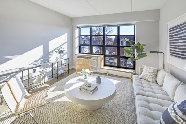 Cozy living room with modern decor at Embankment House Apartments, luxury living by the river