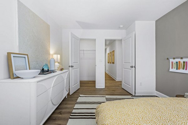 Elegant bedroom with chic decor at Affinity at Kendrick Apartments, a Greystar luxury apartment community