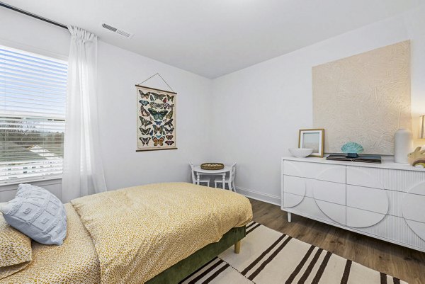 Cozy bedroom with elegant decor at Affinity at Kendrick Apartments