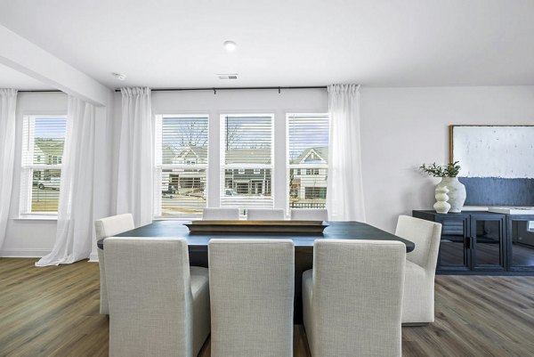 Elegant dining room with modern fixtures at Affinity at Kendrick Apartments