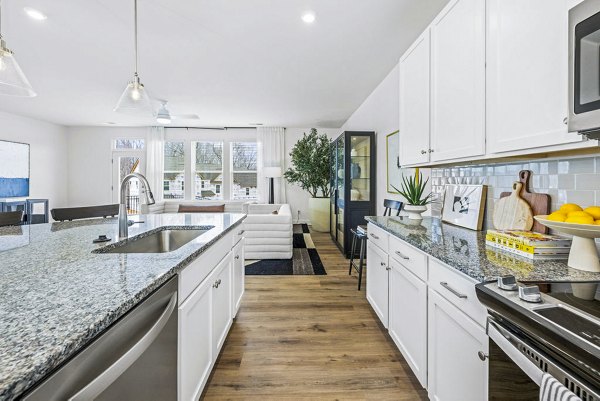 Modern kitchen with stainless steel appliances at Affinity at Kendrick Apartments