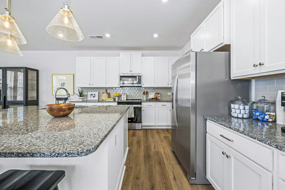 Modern kitchen featuring stainless steel appliances in Affinity at Kendrick Apartments