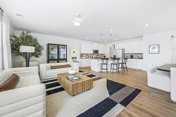Spacious living room with modern decor in Affinity at Kendrick Apartments