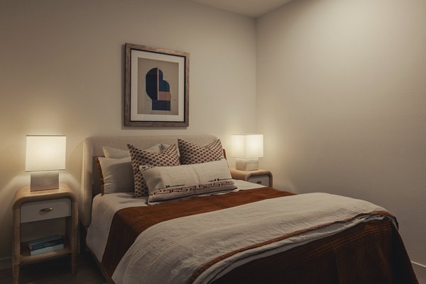 bedroom at Denizen Apartments