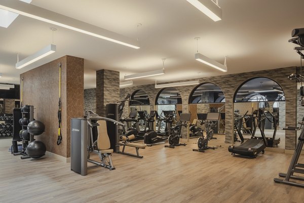 fitness center at Denizen Apartments