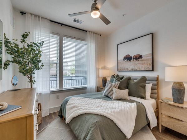 Bedroom with contemporary decor at The Met Apartments