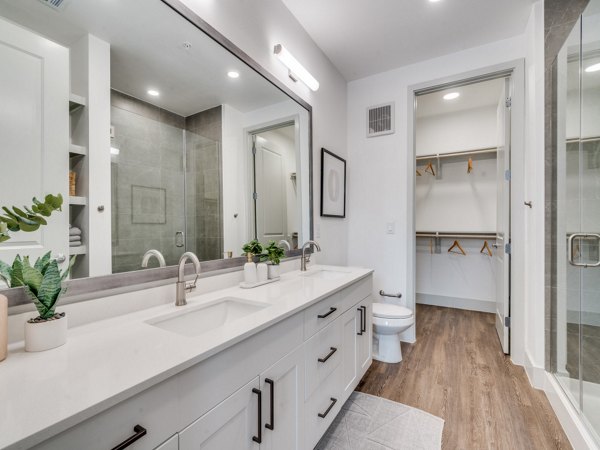 Modern bathroom with sleek fixtures at The Met Apartments