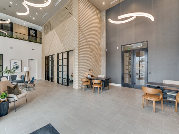 Clubhouse with luxury furnishings and spacious seating at The Met Apartments